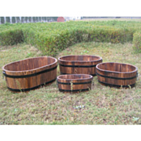 Backyard Expressions 4 Piece Oval Wooden Barrel Planter Set